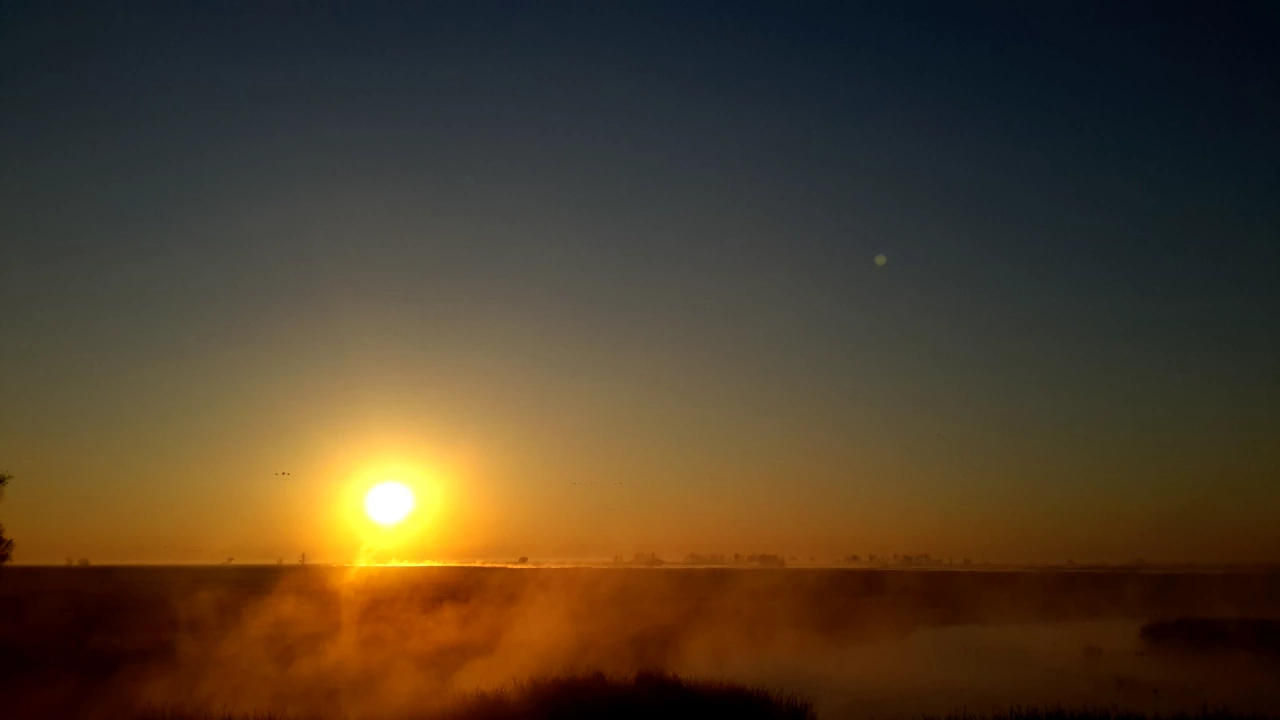 Sunrise timelapse at Merced Wildlife Refuge over a flat earth